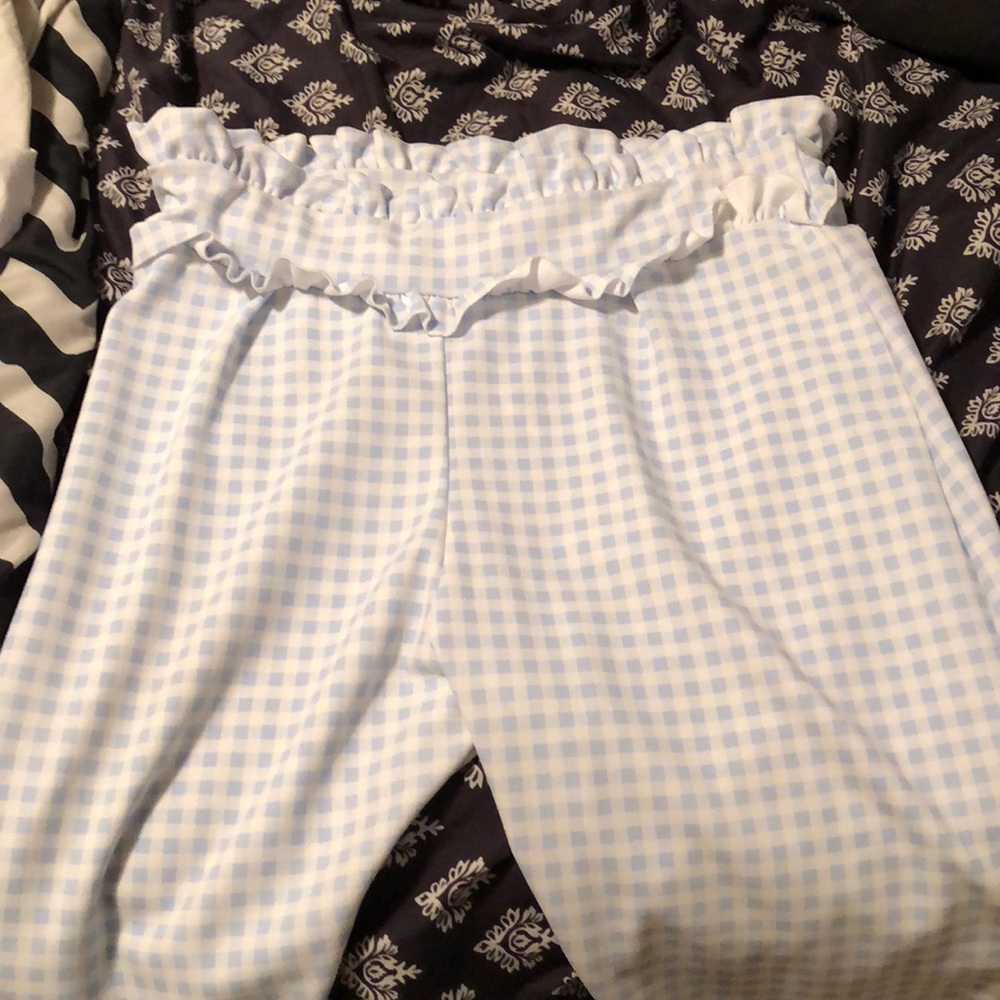 Blue and white checkered print trousers